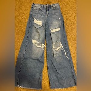 High Waisted medium wash wide leg Hollister jeans with holes